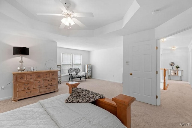 133 Raspberry Ln, Camillus, NY 13031 - bedroom with light colored carpet, a raised ceiling, and ceiling fan