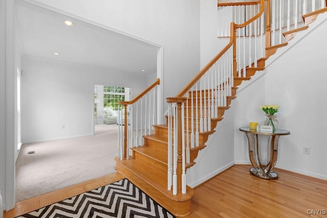 133 Raspberry Ln, Camillus, NY 13031 - stairway featuring wood finished floors and recessed lighting