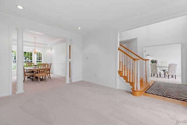 133 Raspberry Ln, Camillus, NY 13031 - living room with crown molding, a chandelier, carpet floors, stairs, and recessed lighting