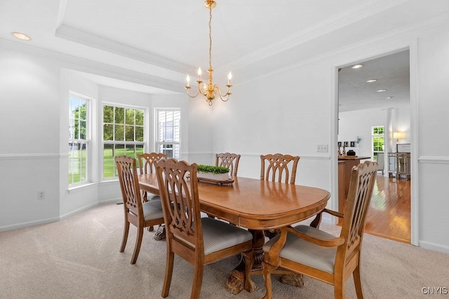 133 Raspberry Ln, Camillus, NY 13031 - dining area featuring healthy amount of natural light, light carpet, a chandelier, ornamental molding, and recessed lighting