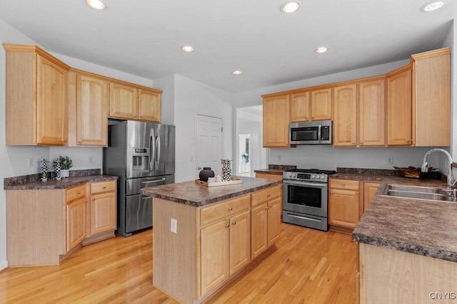 133 Raspberry Ln, Camillus, NY 13031 - kitchen with appliances with stainless steel finishes, light brown cabinets, dark countertops, and recessed lighting