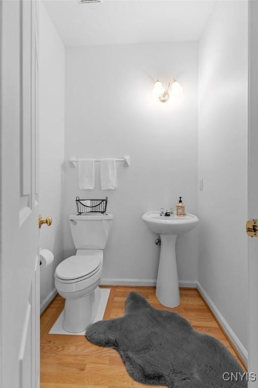 133 Raspberry Ln, Camillus, NY 13031 - bathroom featuring wood finished floors