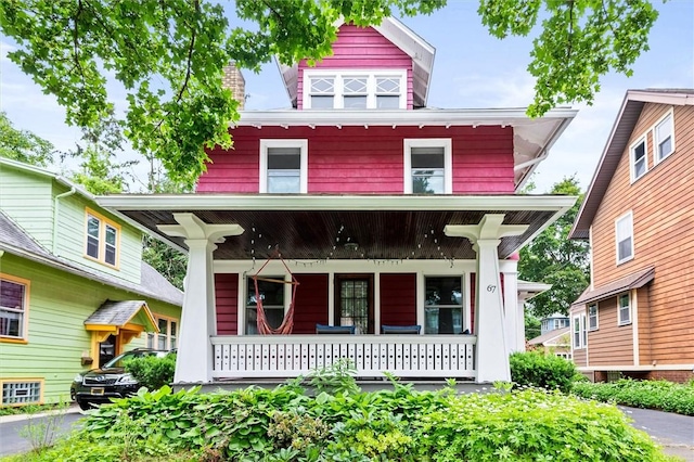 67 Macbeth St, Rochester, NY 14609 - american foursquare style home featuring a porch
