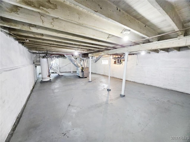 269 Westminster Ave, Buffalo, NY 14215 - below grade area featuring water heater and heating unit