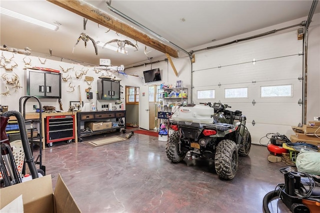 6684 Bishop Rd, Conesus, NY 14435 - garage featuring a workshop area