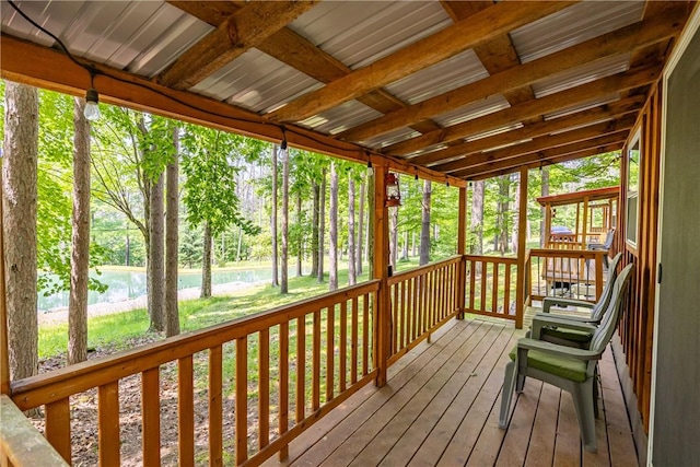 6684 Bishop Rd, Conesus, NY 14435 - wooden terrace featuring view of scattered trees and a lawn