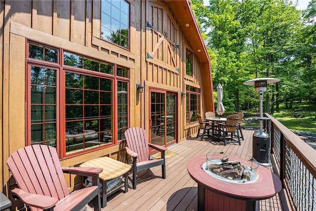 6684 Bishop Rd, Conesus, NY 14435 - wooden terrace featuring outdoor dining area