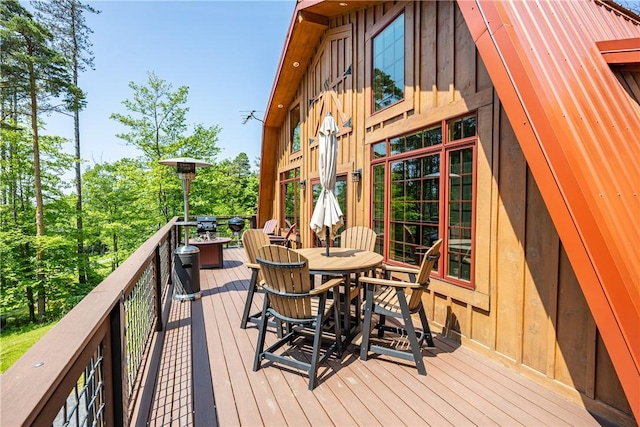 6684 Bishop Rd, Conesus, NY 14435 - wooden terrace featuring outdoor dining area