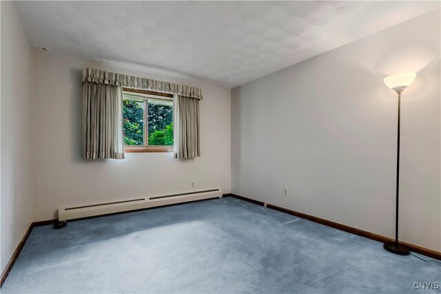 16 Silver Birch Ct, New Hartford, NY 13413 - carpeted spare room with a baseboard radiator and baseboards