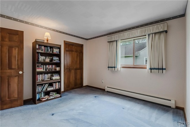16 Silver Birch Ct, New Hartford, NY 13413 - carpeted empty room with a baseboard radiator and baseboards