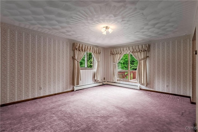 16 Silver Birch Ct, New Hartford, NY 13413 - spare room featuring a baseboard heating unit, carpet floors, and wallpapered walls