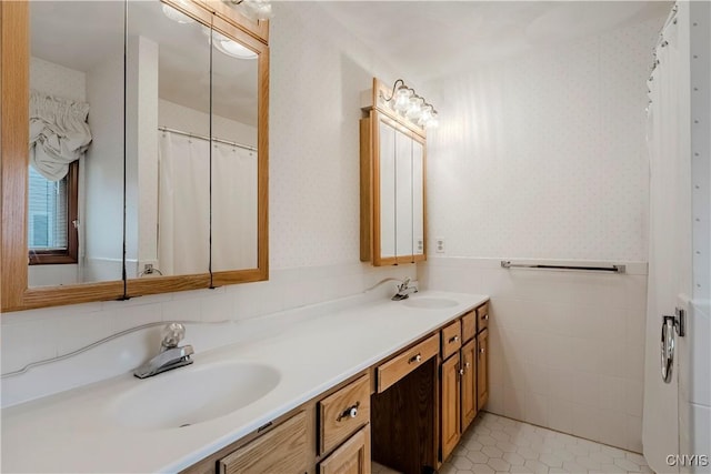 16 Silver Birch Ct, New Hartford, NY 13413 - full bathroom with double vanity, wallpapered walls, and tile patterned flooring