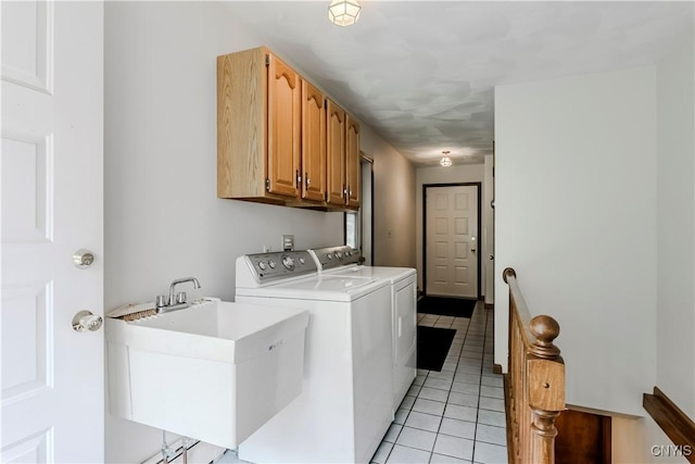16 Silver Birch Ct, New Hartford, NY 13413 - laundry area with washer and dryer, light tile patterned flooring, and cabinet space