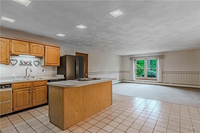 16 Silver Birch Ct, New Hartford, NY 13413 - kitchen with freestanding refrigerator, a center island, light carpet, light countertops, and wainscoting