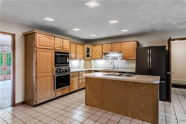 16 Silver Birch Ct, New Hartford, NY 13413 - kitchen featuring black appliances, light tile patterned floors, light countertops, and a kitchen island