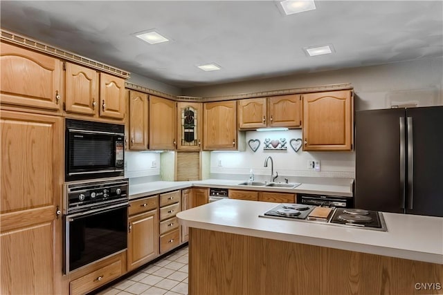 16 Silver Birch Ct, New Hartford, NY 13413 - kitchen featuring black appliances, light countertops, light tile patterned floors, and glass insert cabinets