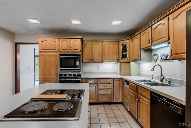 16 Silver Birch Ct, New Hartford, NY 13413 - kitchen with black appliances, light countertops, light tile patterned flooring, and glass insert cabinets