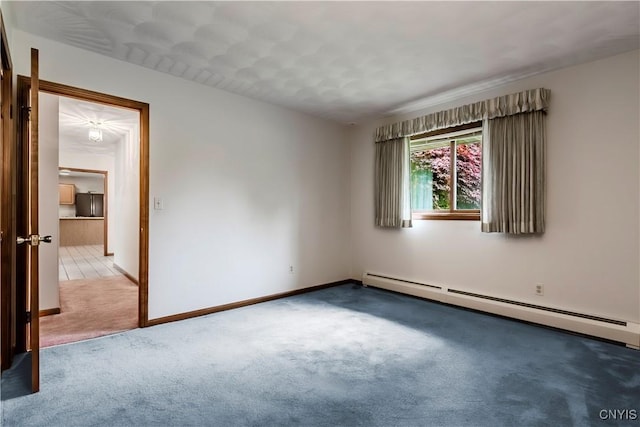 16 Silver Birch Ct, New Hartford, NY 13413 - carpeted spare room with a baseboard radiator and baseboards