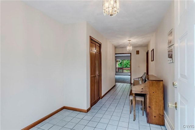 16 Silver Birch Ct, New Hartford, NY 13413 - hall featuring a chandelier, baseboard heating, and light tile patterned flooring