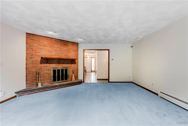 16 Silver Birch Ct, New Hartford, NY 13413 - unfurnished living room featuring a baseboard radiator, carpet floors, and a brick fireplace