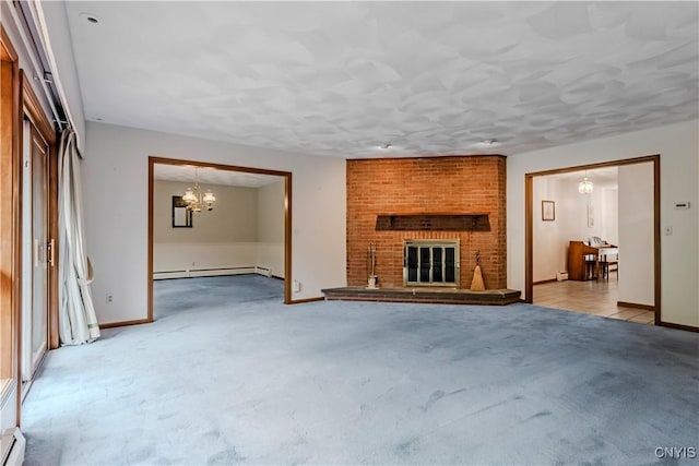 16 Silver Birch Ct, New Hartford, NY 13413 - unfurnished living room with a baseboard heating unit, a chandelier, light colored carpet, a brick fireplace, and a baseboard radiator