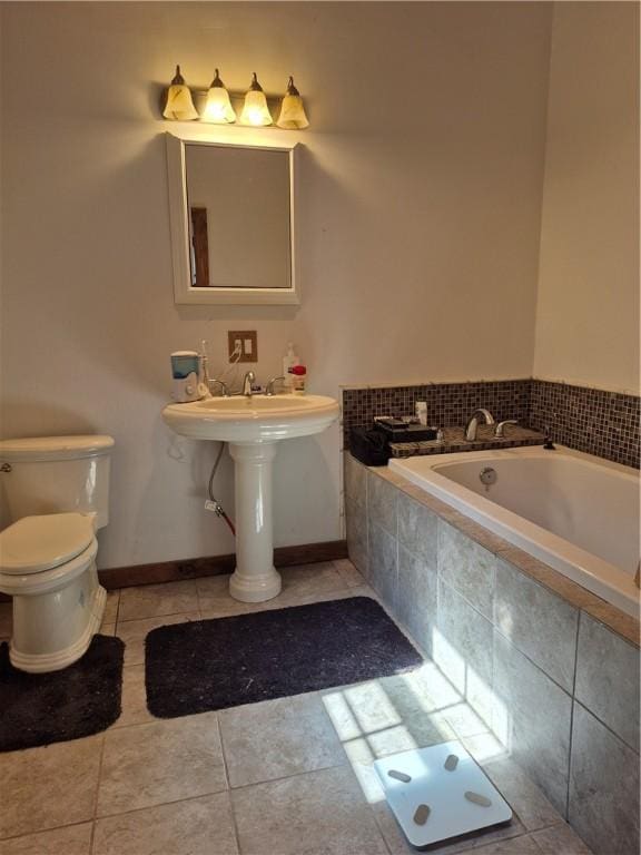 414 Oquaga Lake Rd, Sanford, NY 13754 - full bath featuring a garden tub and tile patterned floors
