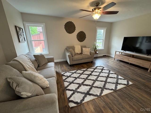 338 Leonard St, Oneida-Inside, NY 13421 - living area with healthy amount of natural light, ceiling fan, and wood finished floors