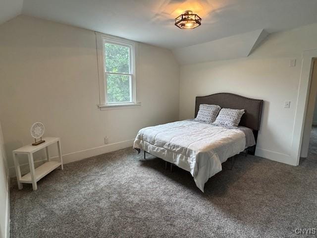 338 Leonard St, Oneida-Inside, NY 13421 - carpeted bedroom with vaulted ceiling and baseboards