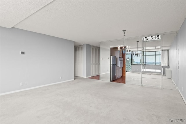 1088 Delaware Ave Unit 9I, Buffalo, NY 14209 - spare room with a textured ceiling and carpet floors