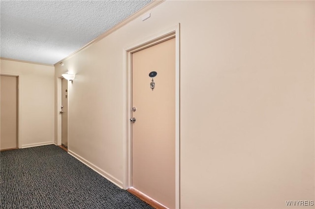 1088 Delaware Ave Unit 9I, Buffalo, NY 14209 - hall featuring crown molding, a textured ceiling, and dark colored carpet