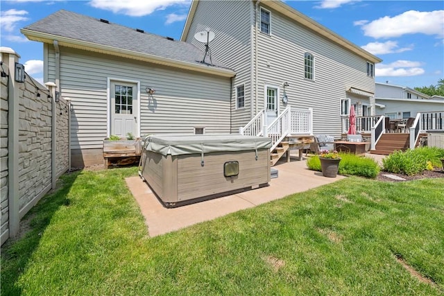 16 Leah Ln, Chili, NY 14514 - back of house with a hot tub, a patio area, and a deck