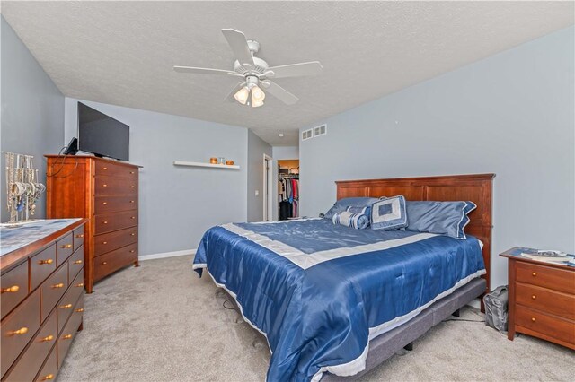 16 Leah Ln, Chili, NY 14514 - bedroom featuring light carpet, a textured ceiling, a ceiling fan, and a spacious closet