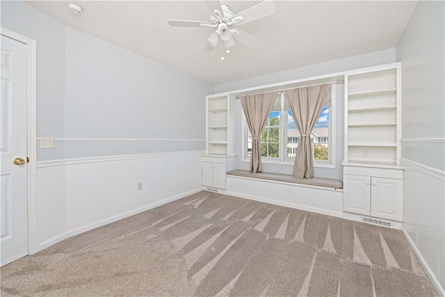 16 Leah Ln, Chili, NY 14514 - carpeted empty room with a smoke detector and a ceiling fan