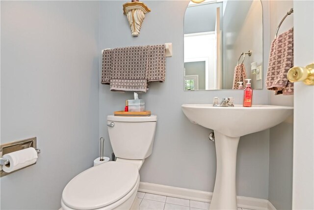 16 Leah Ln, Chili, NY 14514 - bathroom featuring toilet and tile patterned flooring