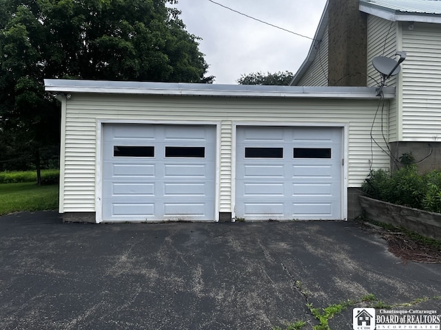 4871 Bayview Rd, Ellery, NY 14712 - garage with asphalt driveway