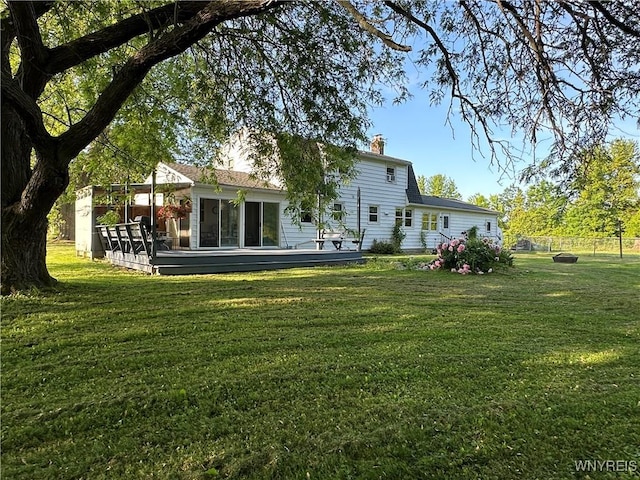 4214 Wilson Burt Rd, Wilson, NY 14172 - rear view of property with a deck and a chimney