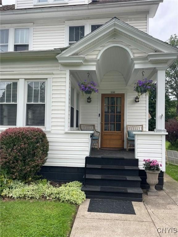 336 Hickok Ave, Syracuse, NY 13206 - doorway to property featuring covered porch