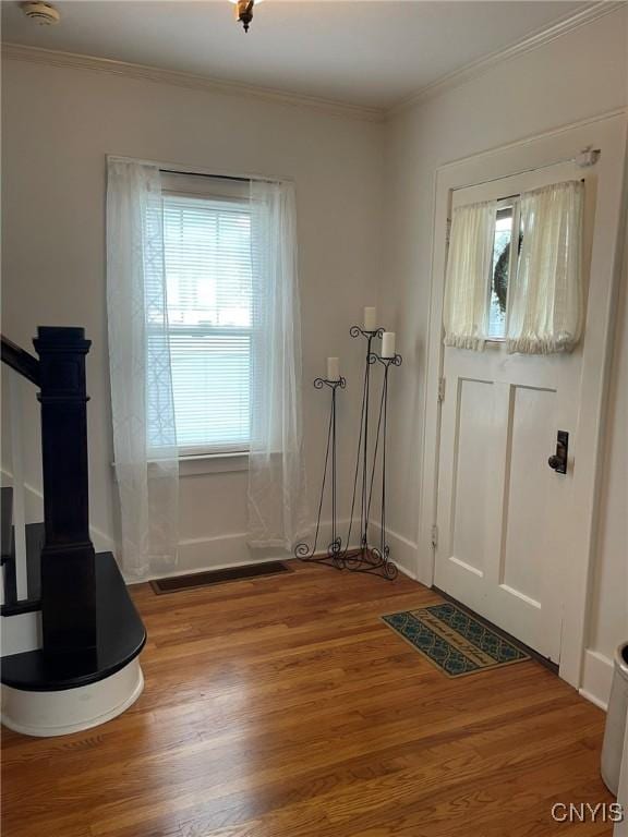 336 Hickok Ave, Syracuse, NY 13206 - foyer with wood finished floors and ornamental molding