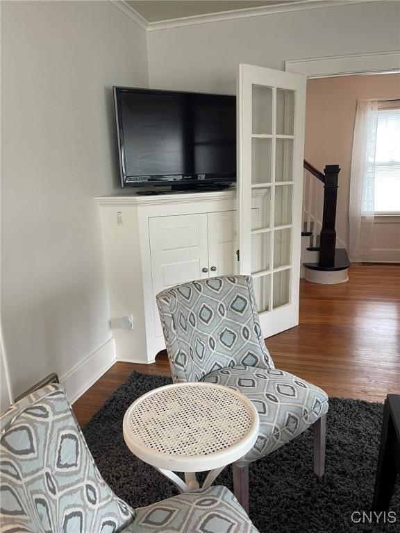 336 Hickok Ave, Syracuse, NY 13206 - living area with wood finished floors and crown molding
