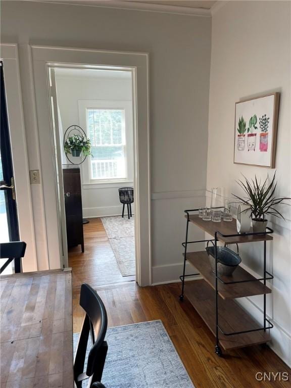 336 Hickok Ave, Syracuse, NY 13206 - hallway featuring ornamental molding, wood finished floors, and a desk