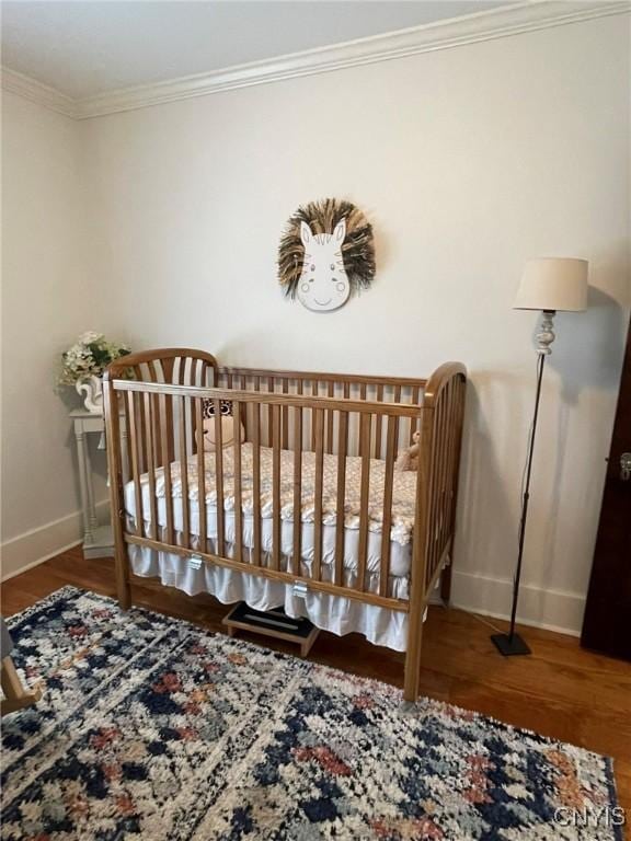 336 Hickok Ave, Syracuse, NY 13206 - bedroom featuring wood finished floors and ornamental molding