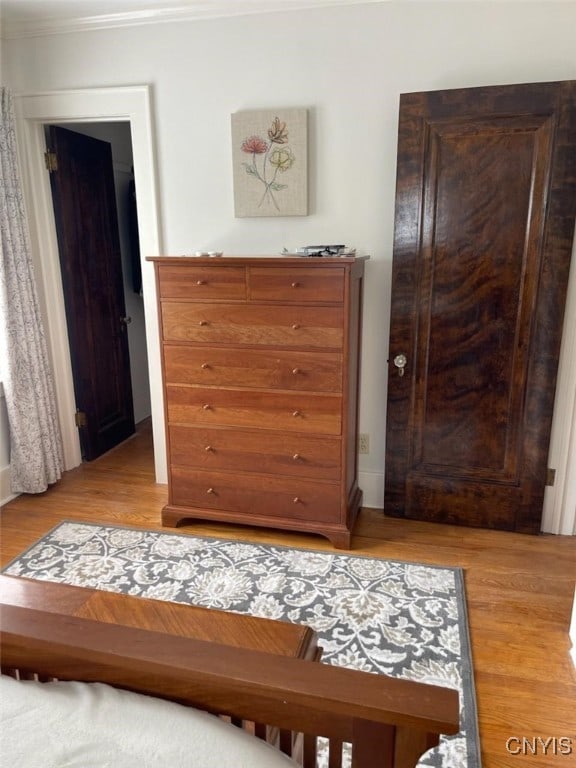 336 Hickok Ave, Syracuse, NY 13206 - bedroom with crown molding and light wood finished floors