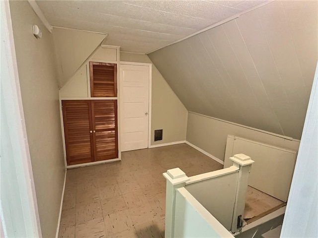 60 Clairmount St, Rochester, NY 14621 - bonus room with tile patterned floors and vaulted ceiling