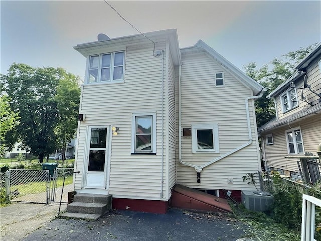 60 Clairmount St, Rochester, NY 14621 - rear view of house with entry steps and a gate