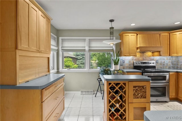 580 Roycroft Blvd, Cheektowaga, NY 14225 - kitchen featuring range with two ovens, custom exhaust hood, light tile patterned floors, dark countertops, and recessed lighting