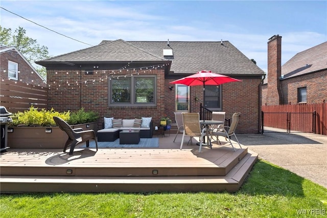 580 Roycroft Blvd, Cheektowaga, NY 14225 - back of property featuring brick siding, an outdoor living space, roof with shingles, and a wooden deck