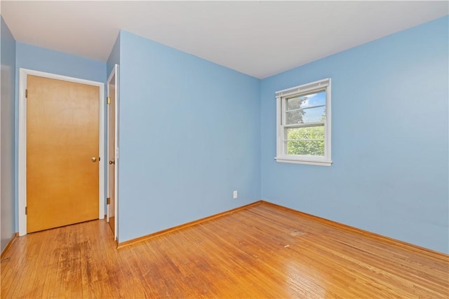 970 Elmgrove Rd, Gates, NY 14624 - empty room with light wood-style flooring and baseboards
