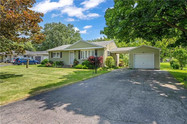 970 Elmgrove Rd, Gates, NY 14624 - single story home featuring a front lawn, a garage, driveway, and a carport