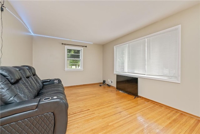970 Elmgrove Rd, Gates, NY 14624 - living area with light wood-style floors and baseboards