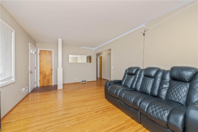 970 Elmgrove Rd, Gates, NY 14624 - living area featuring light wood-style flooring and baseboards